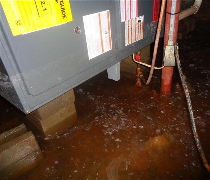 Flooded basement that floor drains couldn't keep up with after heavy rain.